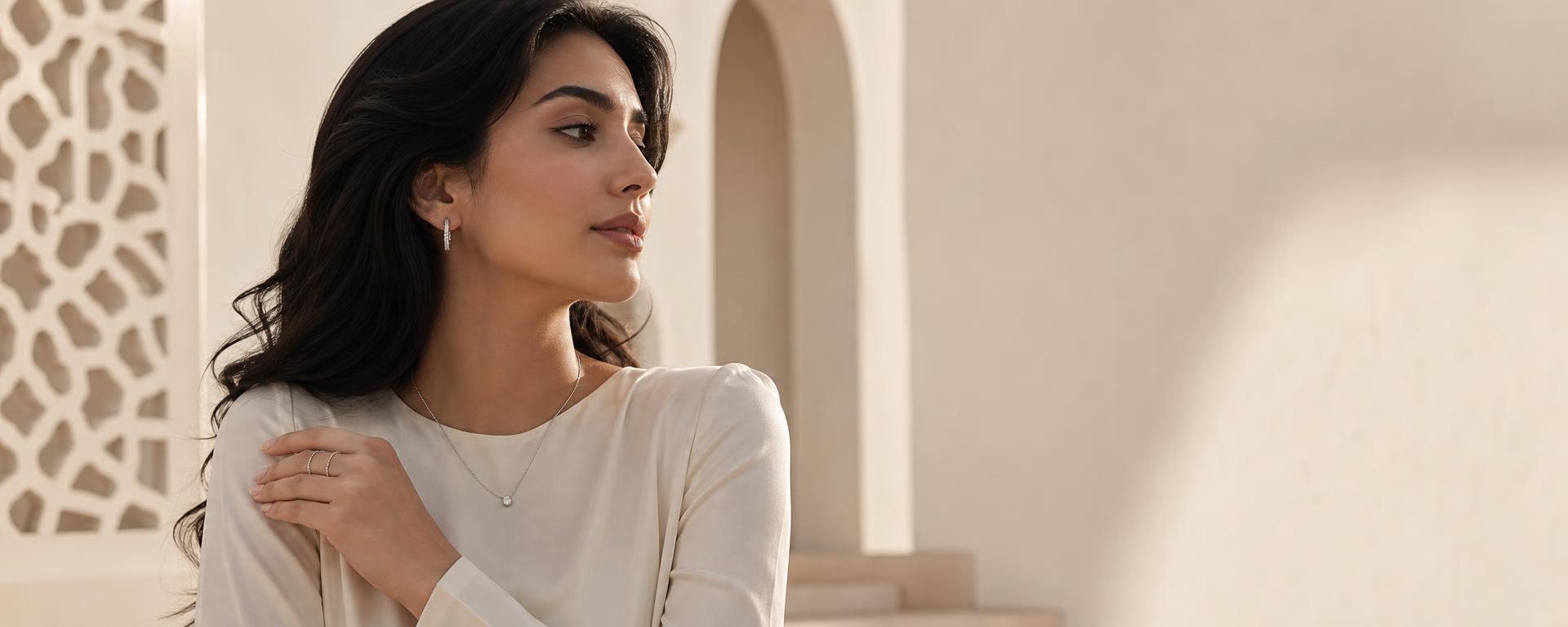 Woman wearing delicate 925 sterling silver jewellery from ZIYO