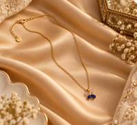 Noof Ribbon Diamond Pendant