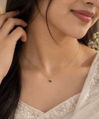 Noof Ribbon Diamond Pendant